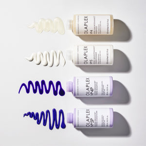 Lineup of  OLAPLEX No.5P Blonde Enhancer™ Toning Conditioner,  OLAPLEX No.4P Blonde Enhancer™ Toning Shampoo,  OLAPLEX No.5 Bond Maintenance® Conditioner, and  OLAPLEX No.4 Bond Maintenance® Shampoo bottles