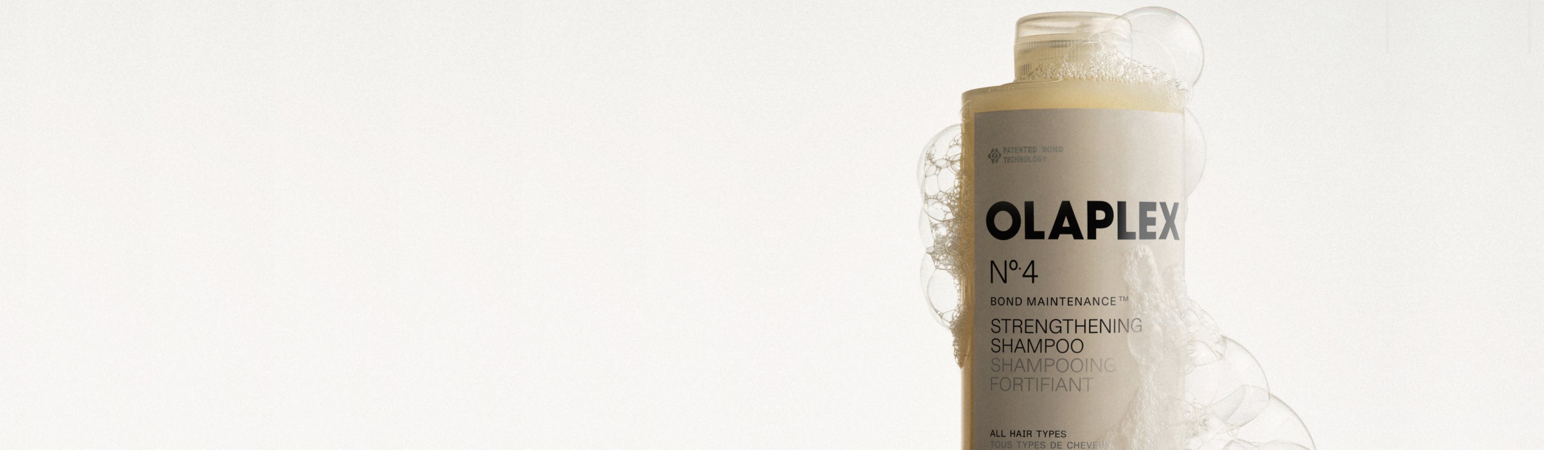 Sudsy image of a shampoo bottle