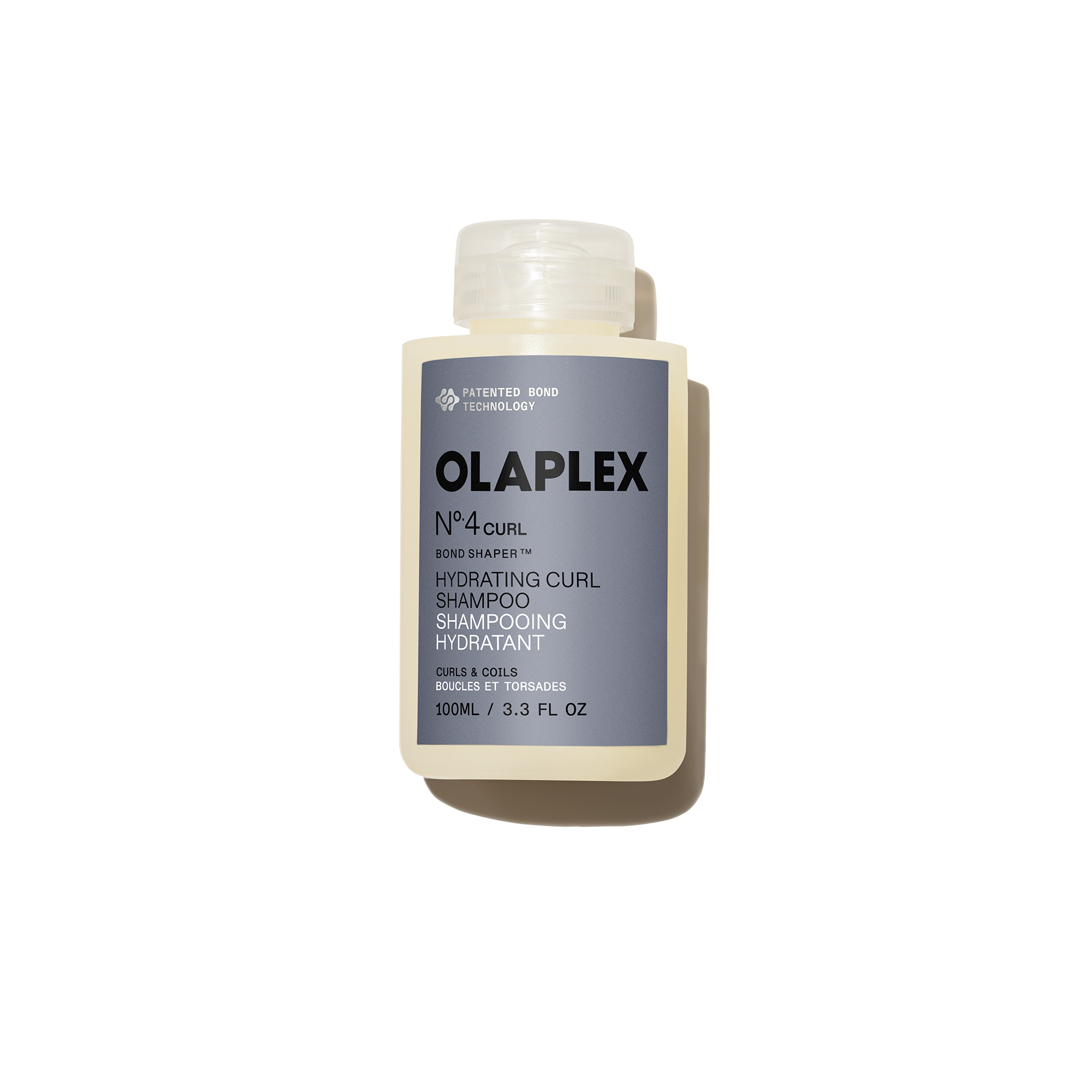Botella de 100 ml de Olaplex Nº.4CURL Bond Shaper Hydrating Curl Shampoo sobre un fondo blanco liso