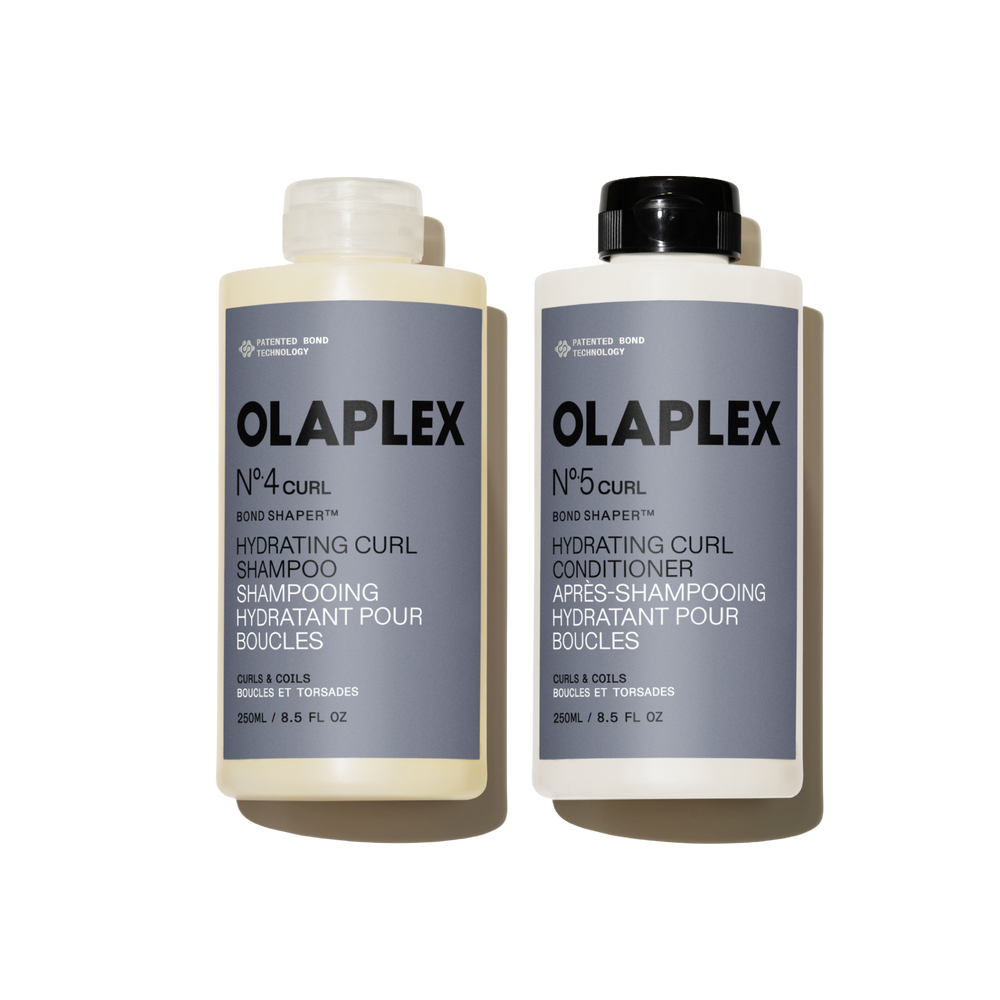 OLAPLEX Nº.4CURL Hydrating Curl Shampoo and Nº.5CURL Hydrating Curl Conditioner 250ML duo on a transparent background. - main view
